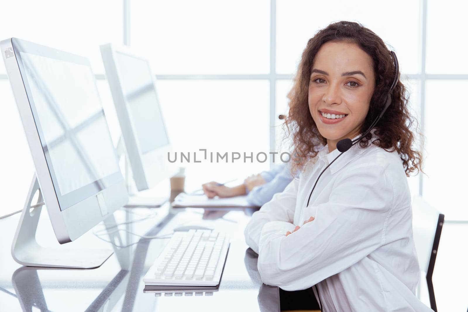 Portrait African American Caucasian women business office call center operator. Helpdesk support phone call team worker female teen smile with microphone headset.telesale marketing agant people.