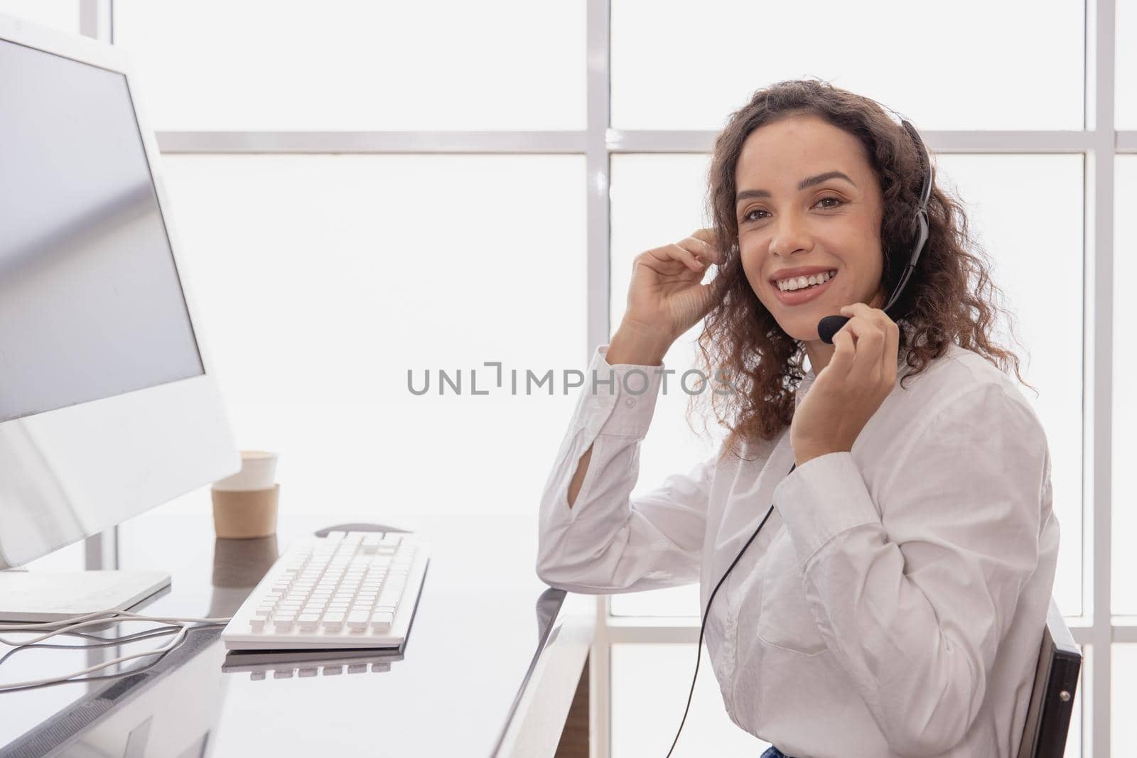 African American women hotline staff working in call center office for customer service assistant officer happy smile.