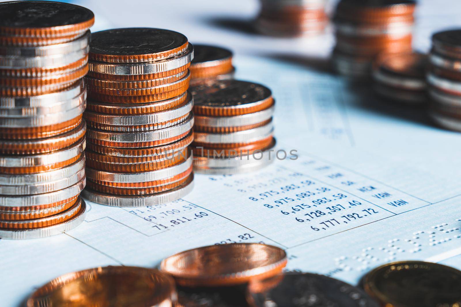 Pile of gold coins stack in finance treasury deposit bank account for saving . Concept of corporate business economy and financial growth by investment in valuable asset to gain cash revenue profit .