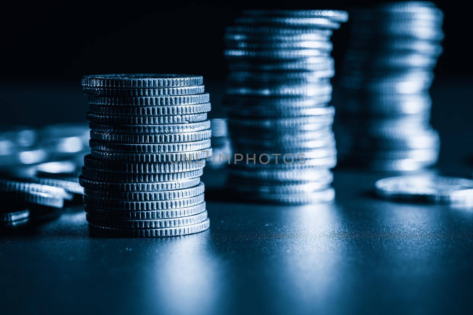 Pile of gold coins stack in finance treasury deposit bank account for saving . Concept of corporate business economy and financial growth by investment in valuable asset to gain cash revenue profit .