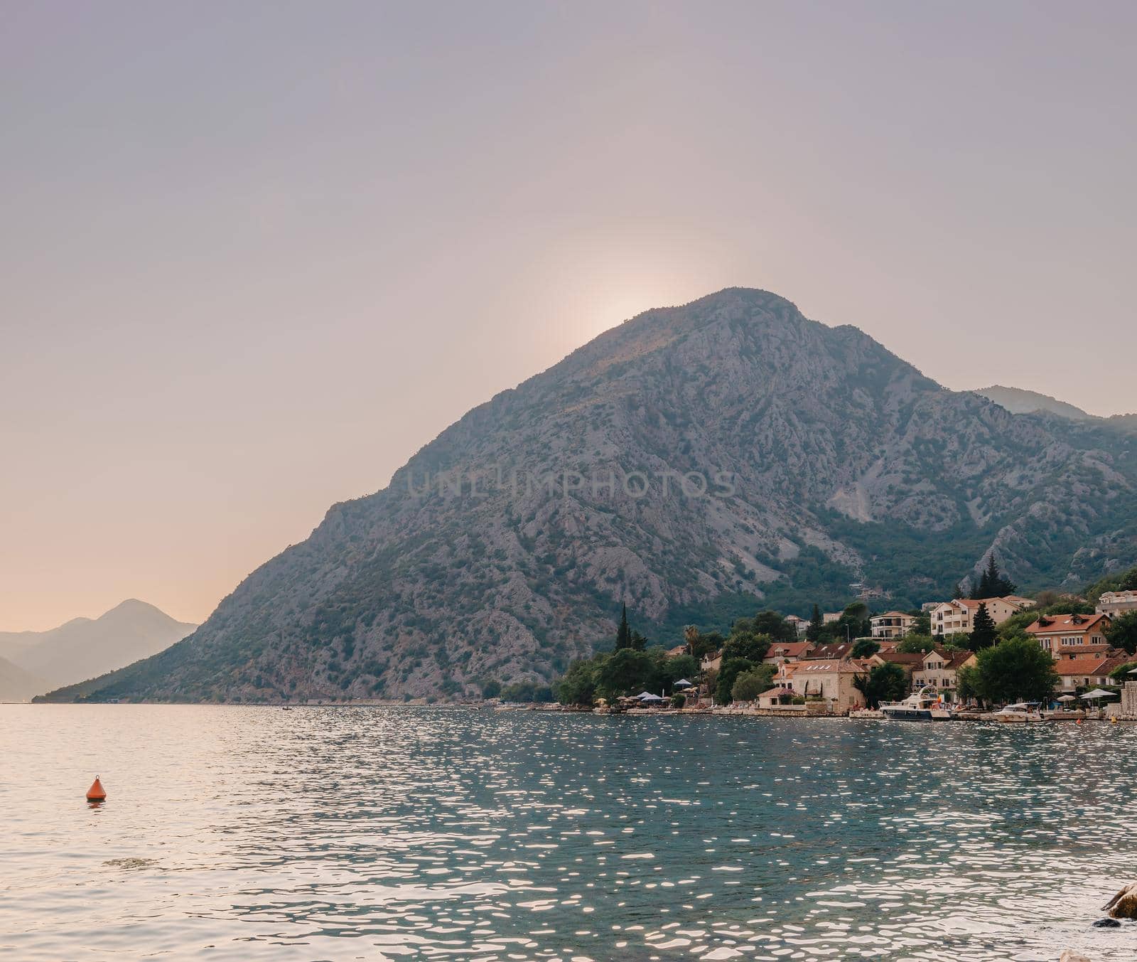 Fishing boat on an oyster farm in the Bay of Kotor, Montenegro. High quality photo.