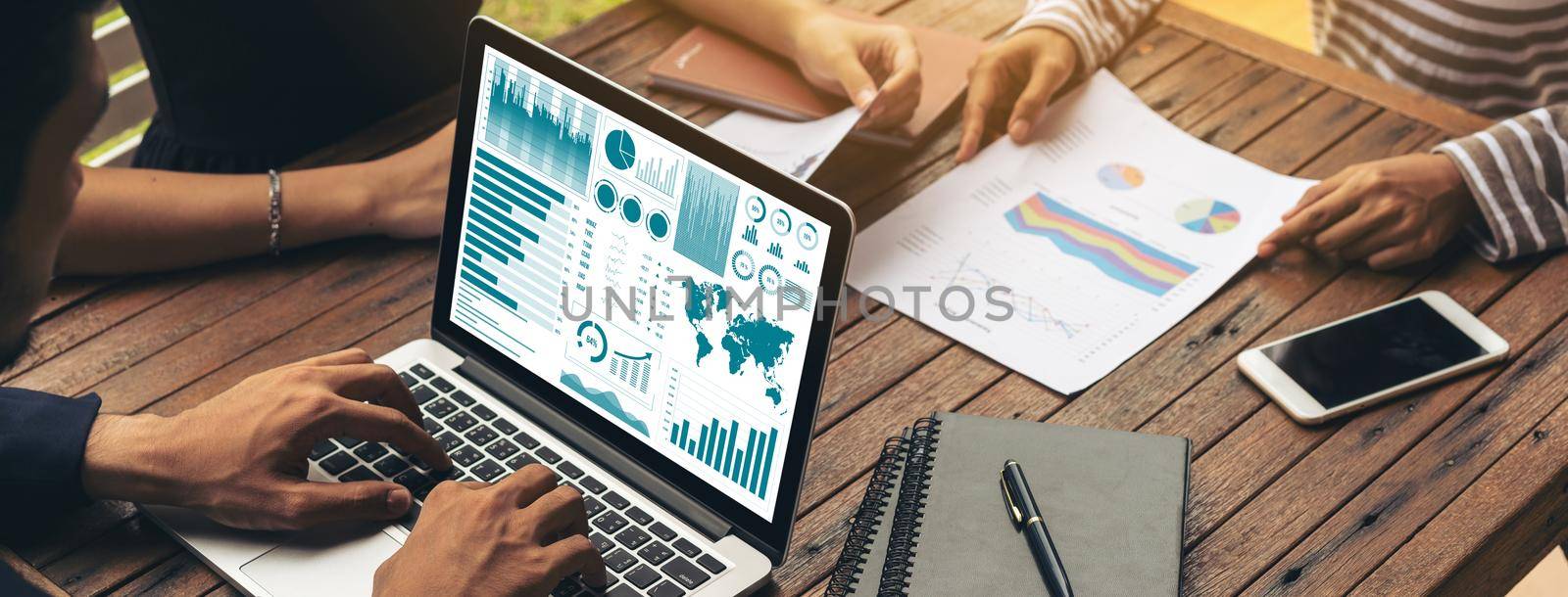 Business data dashboard analysis by ingenious computer software . Investment application display business sales and profit on the computer screen and advise marketing planning decision .