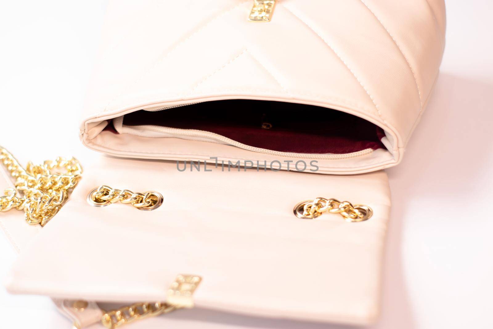 fashion photo of purse. beige woman handbag isolated on white background. Product composition photography.