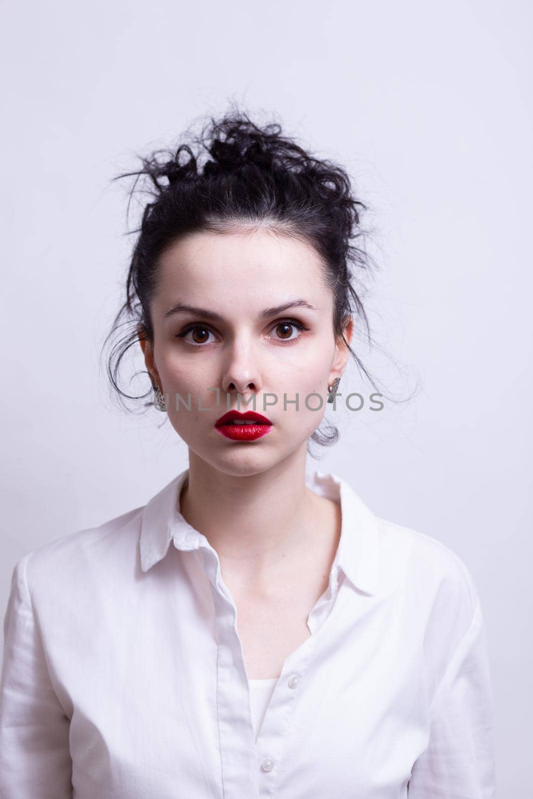 woman with red lips in a white shirt by shilovskaya