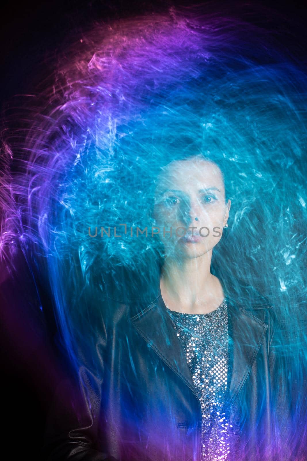 art portrait of a beautiful woman with mixed light. High quality photo