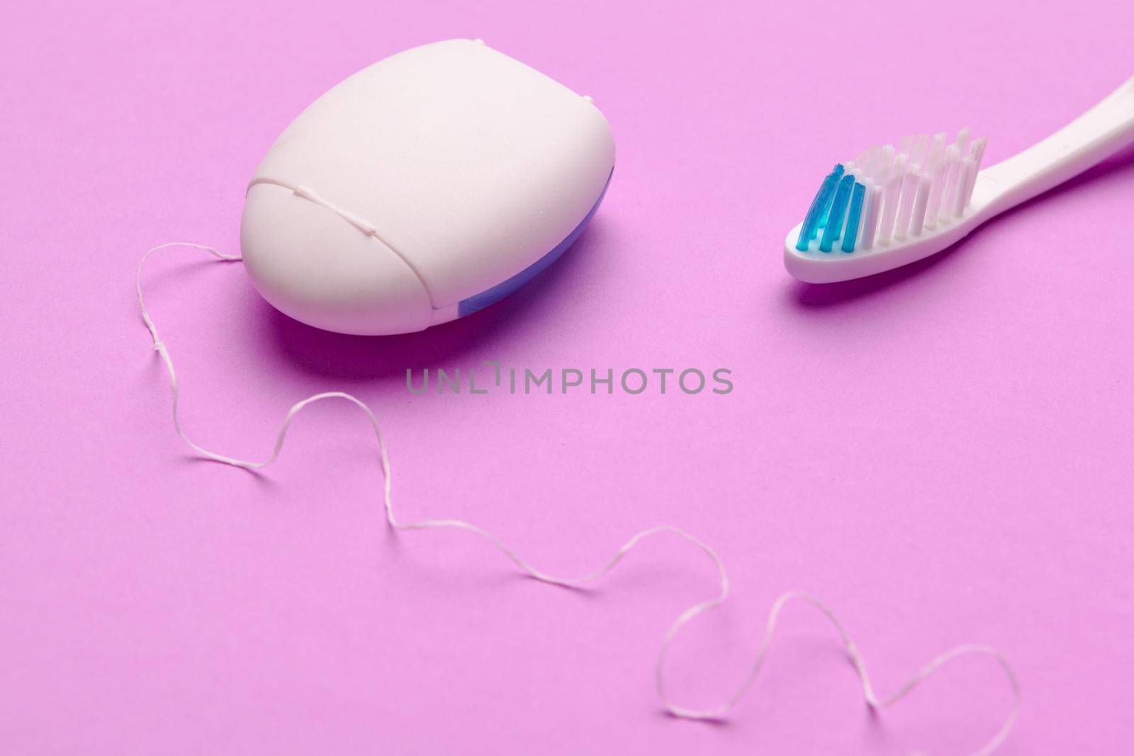 Taking care of teeth, dental concept on color background by Fabrikasimf