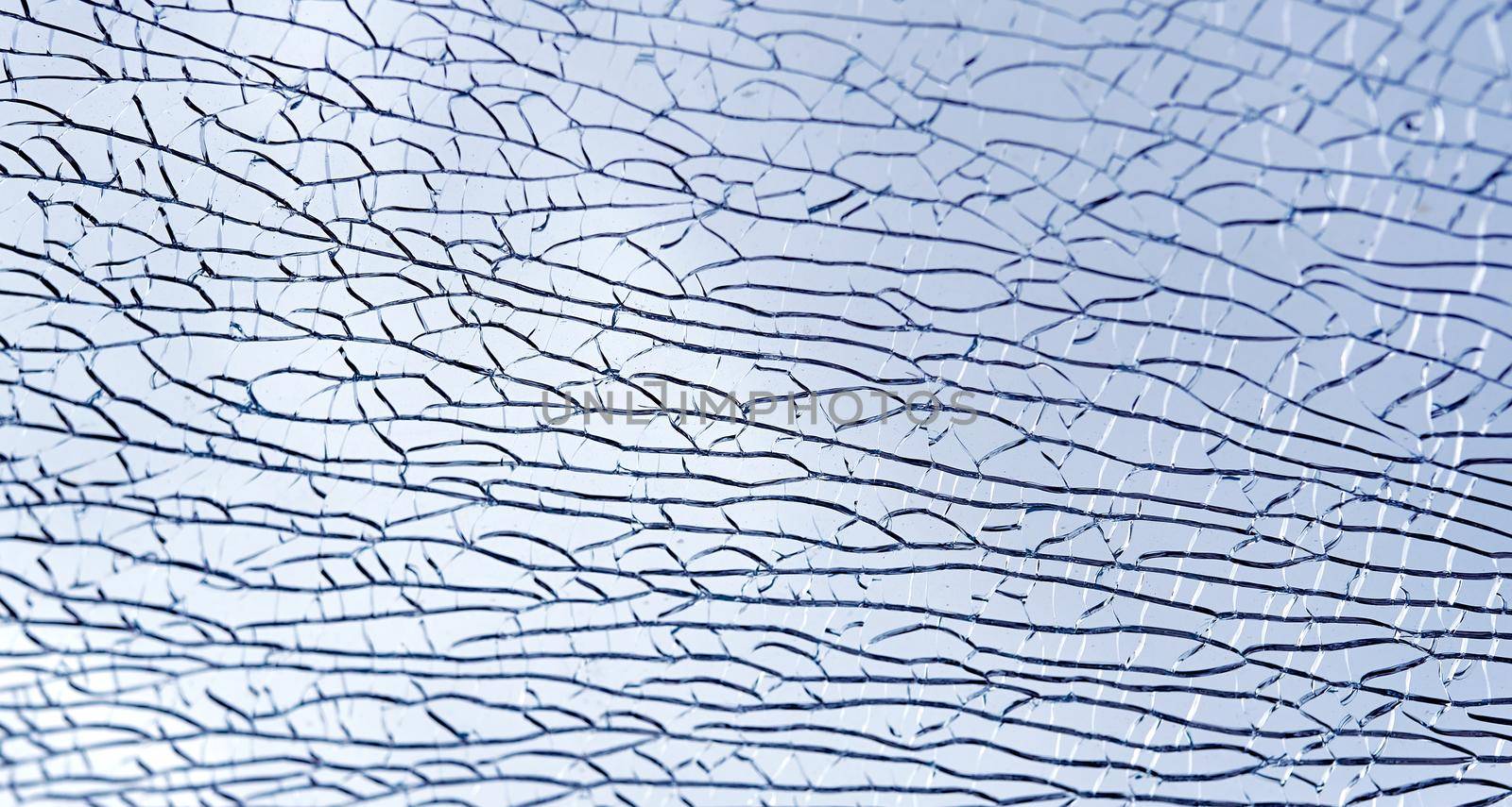 broken broken glass under the bottom crack under the diagonal abstract photo by AntonIlchanka
