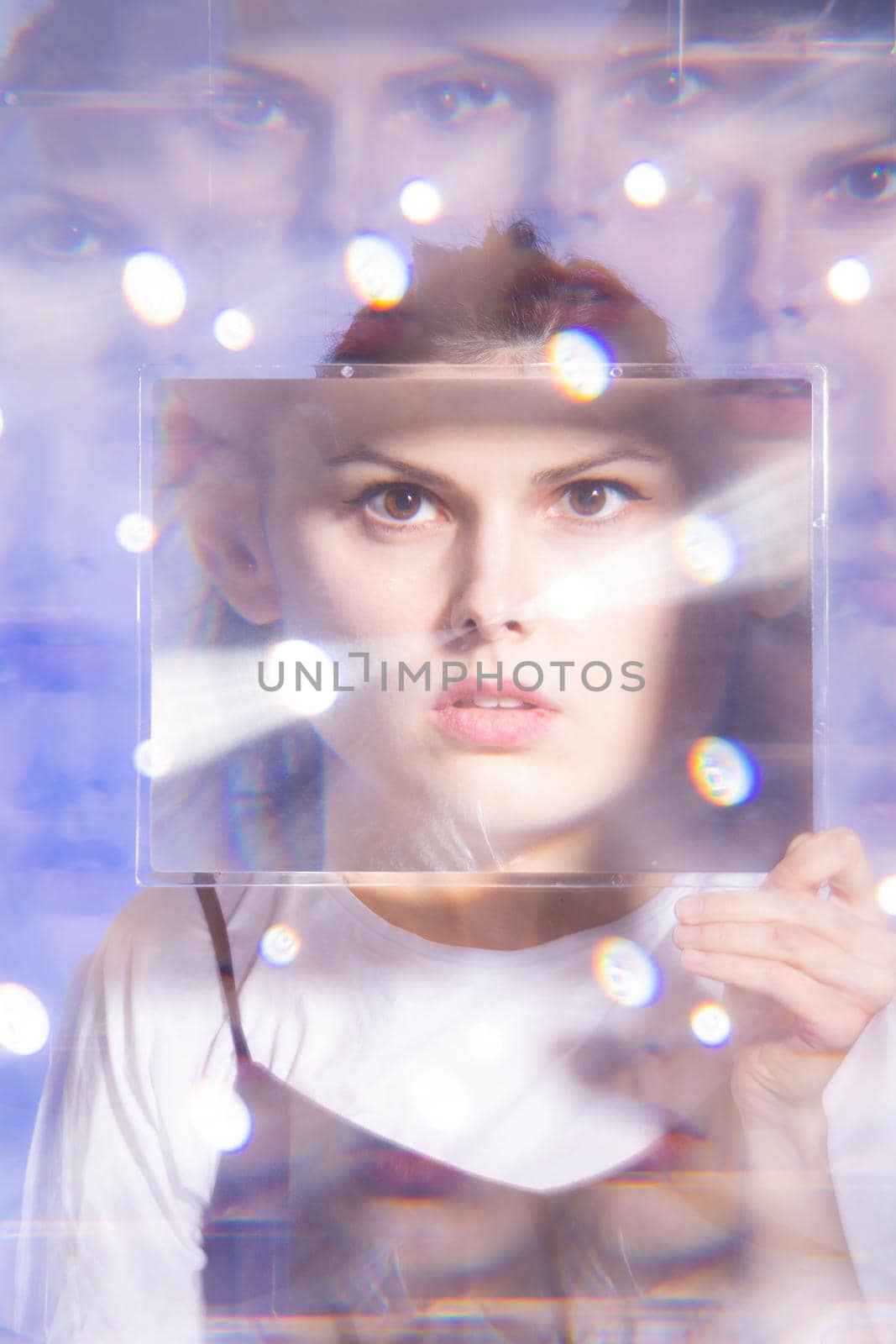beautiful girl with a magnifying glass, art portrait. High quality photo