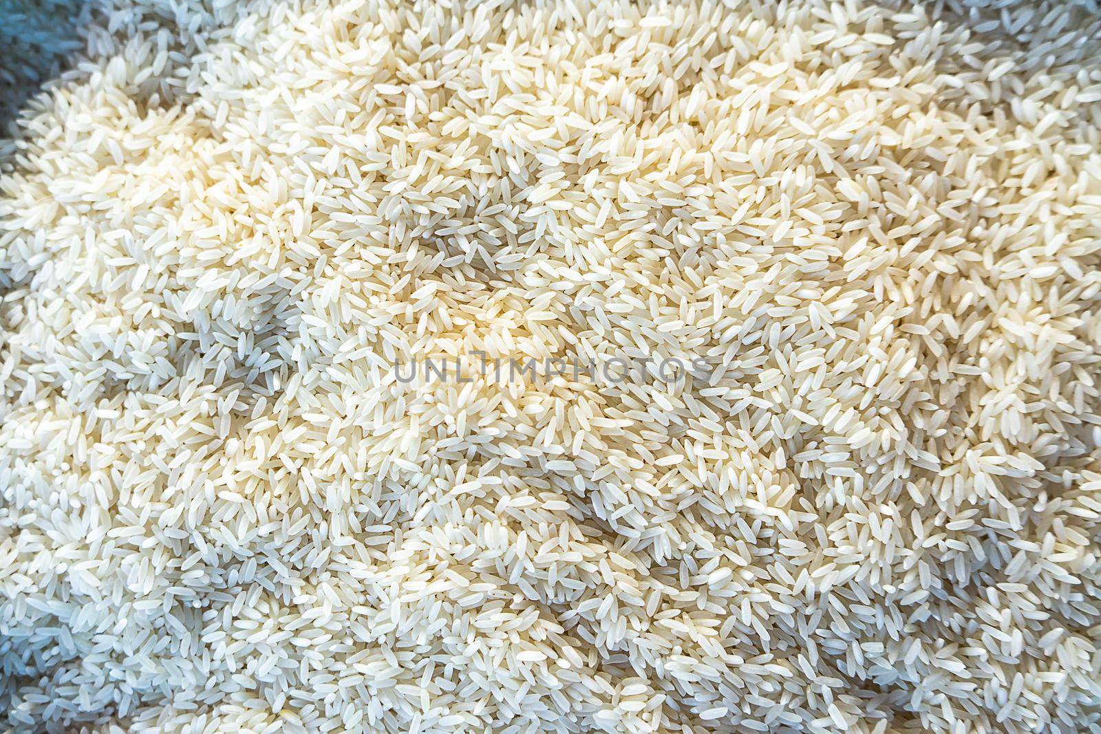 Top view of white rice photo style for wallpaper or texture by cfalvarez