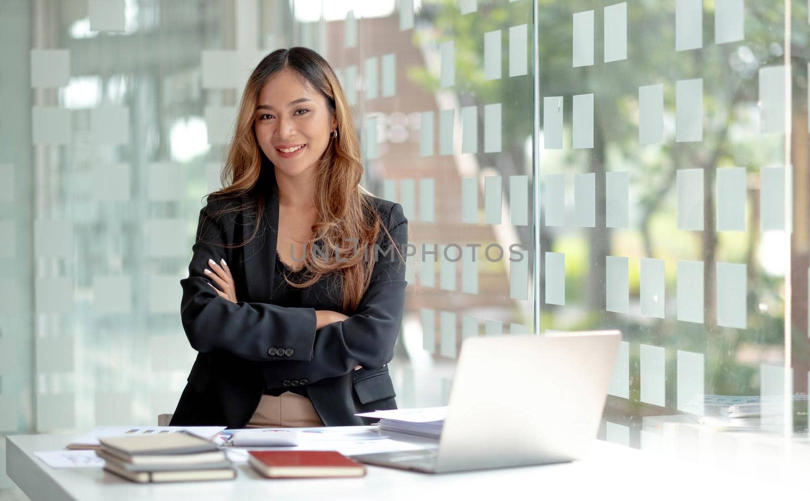 Beautiful asian woman using smartphone, exciting and celebrating with good news of business successful. Small business startup concept. by wichayada