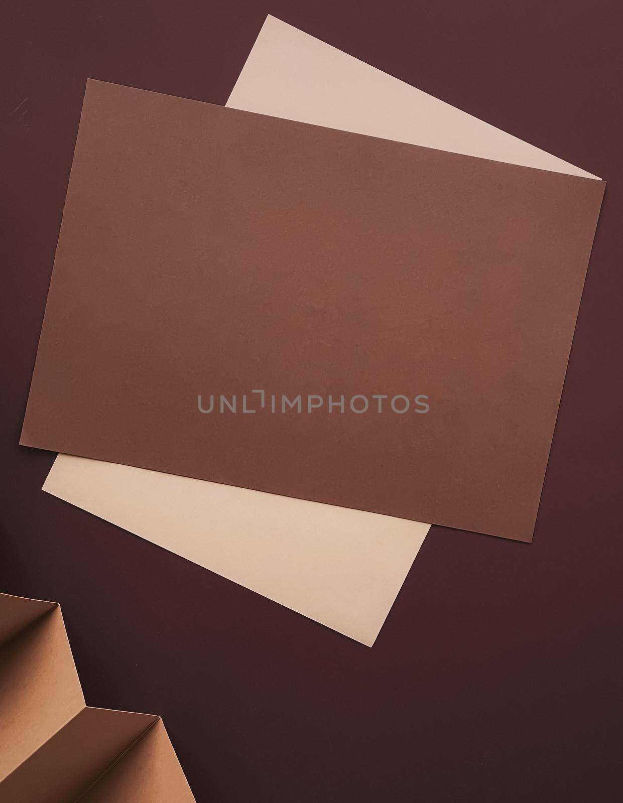 Beige and brown A4 papers as office stationery flatlay, luxury branding flat lay and brand identity design for mockups, work and creativity by Anneleven