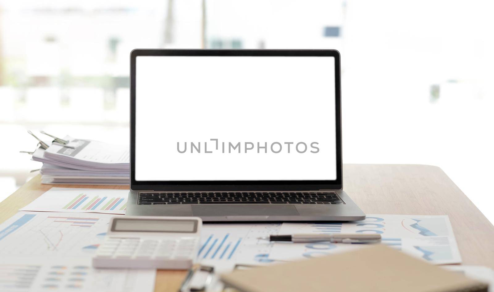 Laptop or notebook with blank screen on the floor service counter in the office. by wichayada