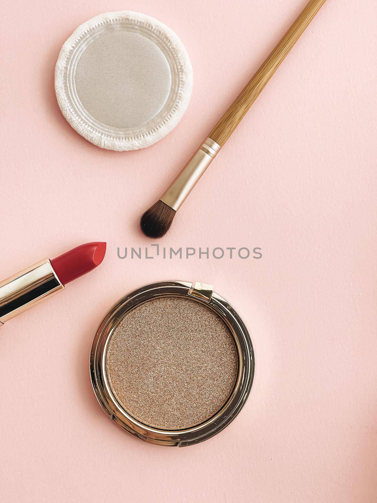 Beauty, make-up and cosmetics flatlay design with copyspace, cosmetic products and makeup tools on peach background, girly and feminine style concept