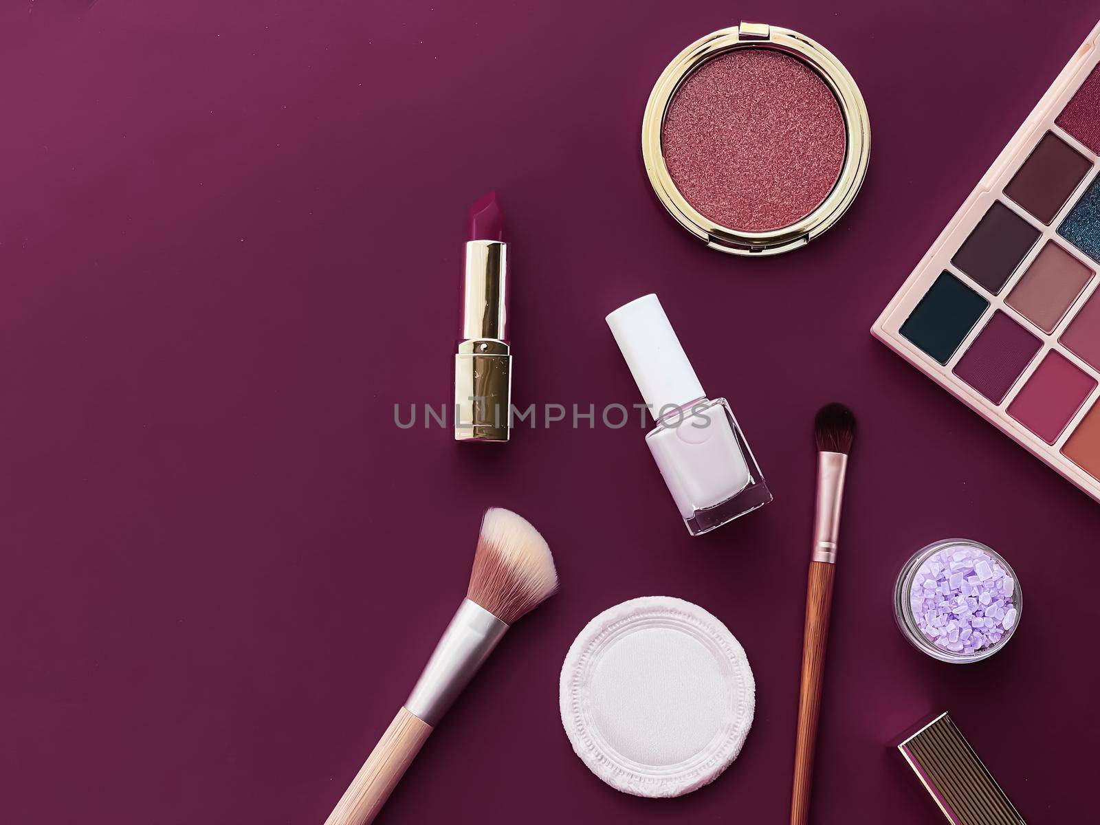 Beauty, make-up and cosmetics flatlay design with copyspace, cosmetic products and makeup tools on purple background, girly and feminine style by Anneleven