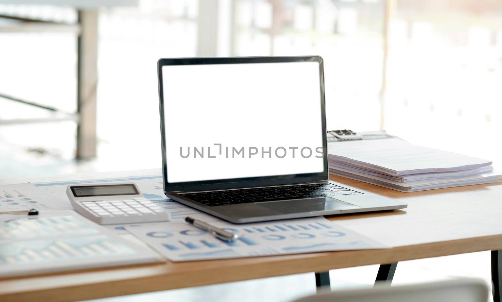 Laptop or notebook with blank screen on the floor service counter in the office. by wichayada