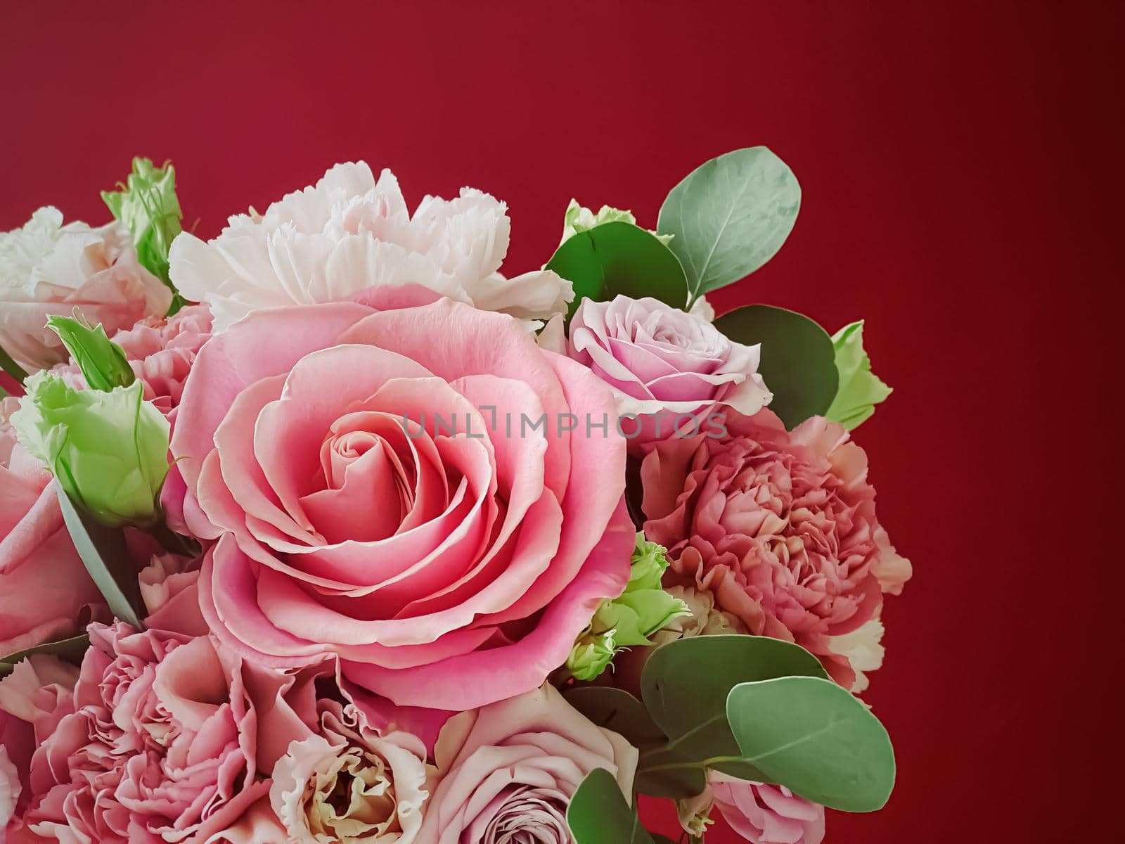 Beautiful flower box on red background, bouquet of blooming flowers as holiday gift, luxury floral design by Anneleven