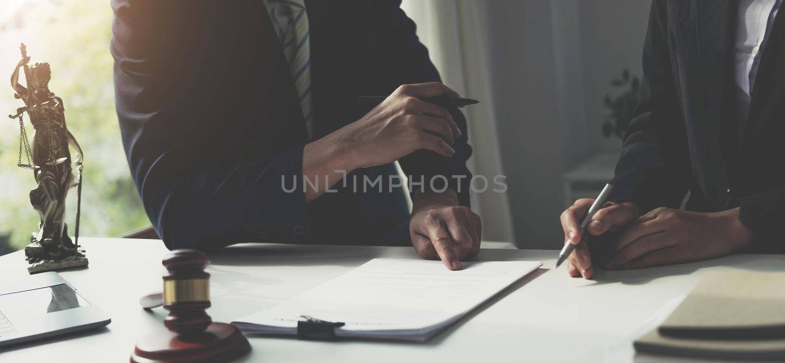 Businessman and lawyer discuss the contract document. Treaty of the law. Sign a contract business..