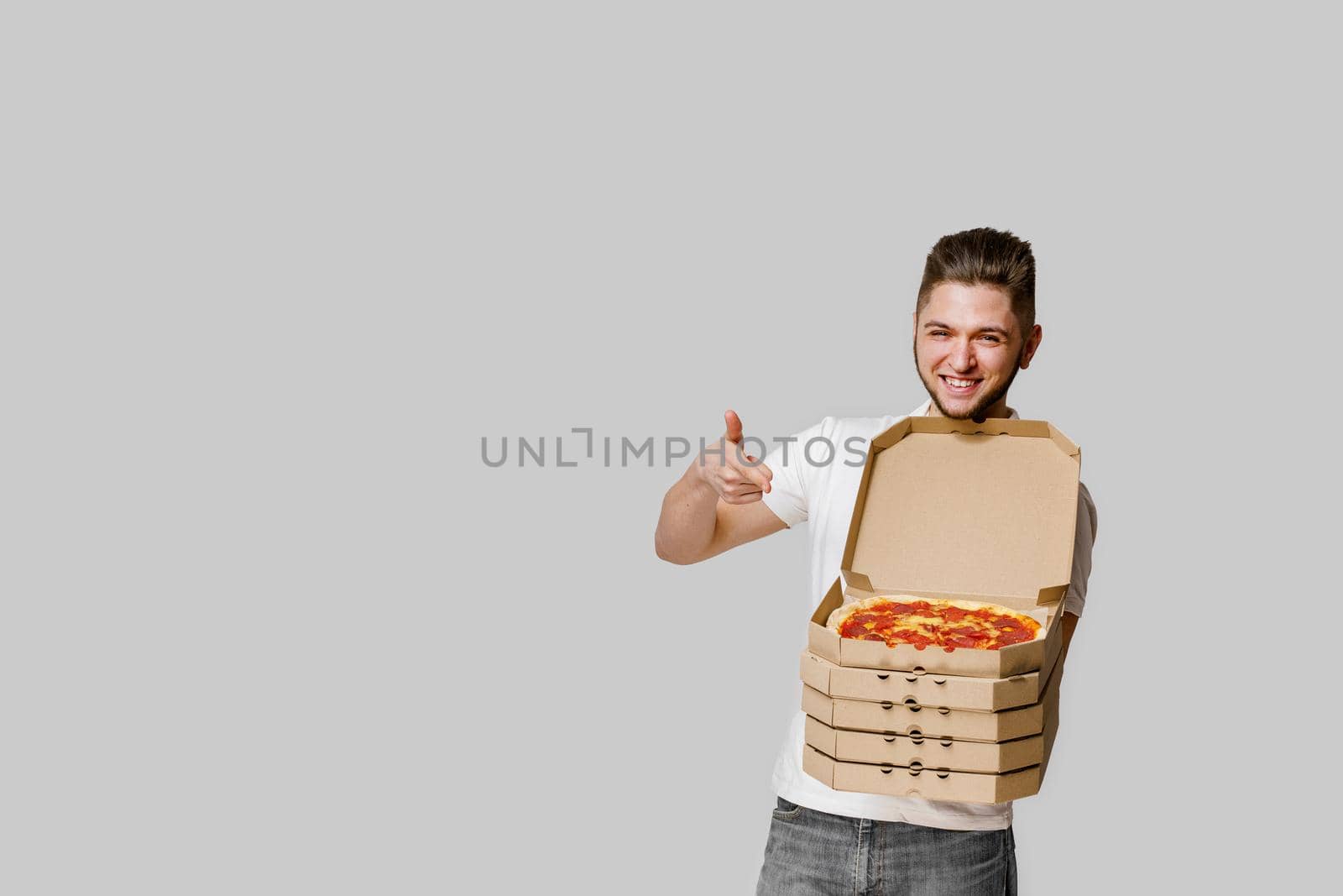 Online 4 pizza boxes safety delivery servise from restaurant. promotion pizza with cheese boards.