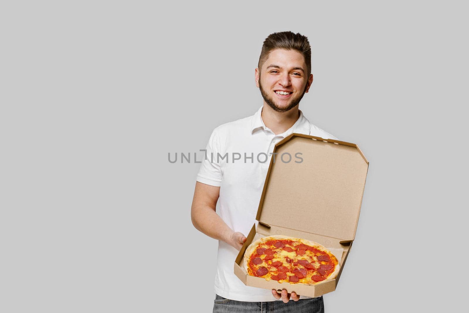 Online pizza safety delivery servise from restaurant. Pizza with cheese boards advertise. Isolated white background with empty space for advertise.