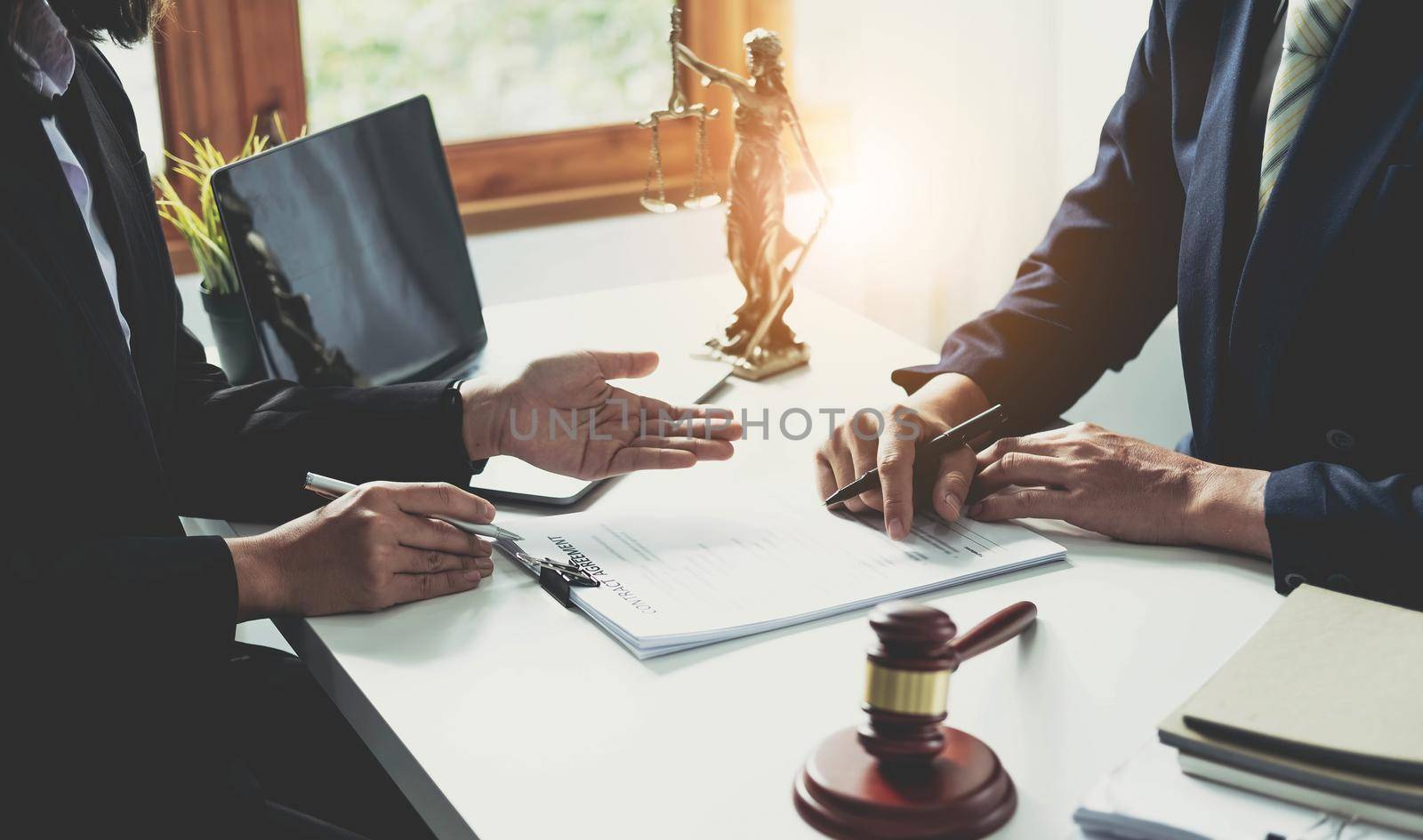 Businessman and lawyer discuss the contract document. Treaty of the law. Sign a contract business..