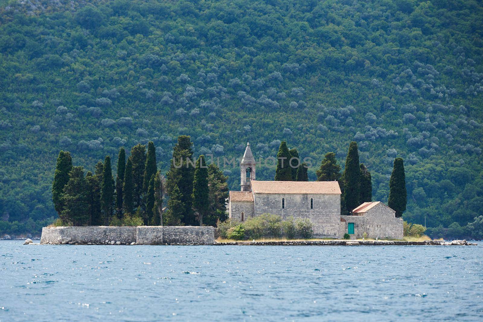 Monastery of St. George on a secluded island in the Adriatic Sea in Montenegro by iceberg