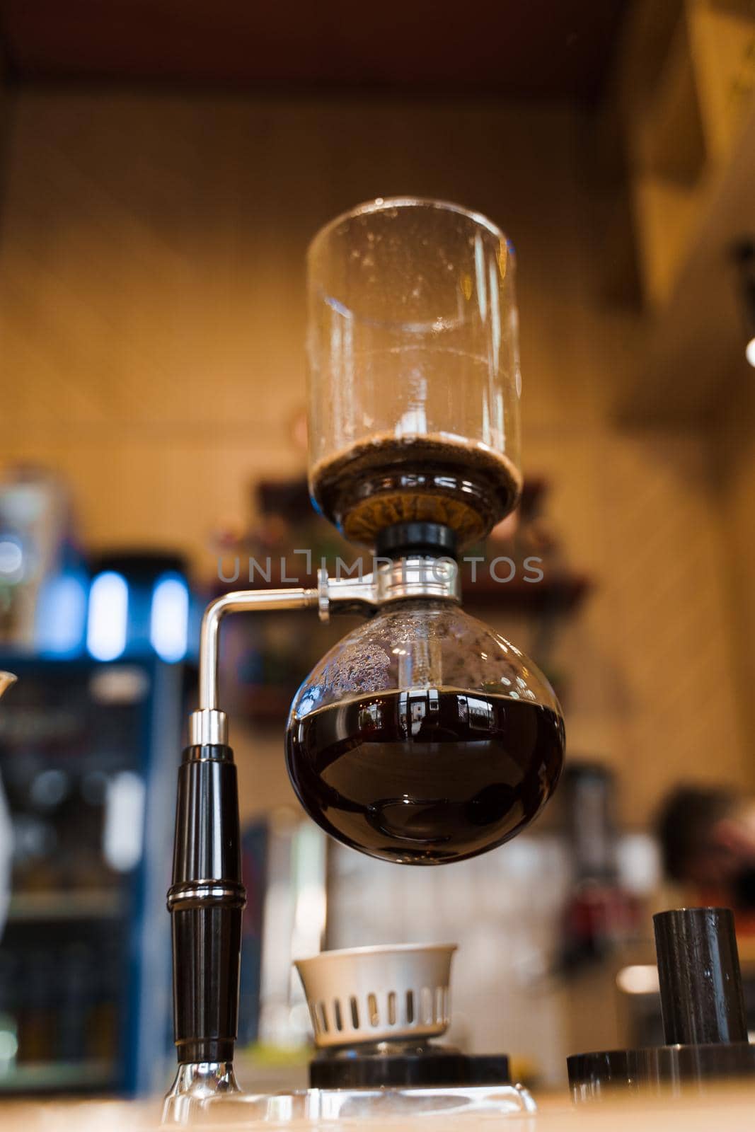 Syphon for coffee brewing in cafe. Coffee brewing syphon alternative method. Advert for social networks for cafe and restaurant.