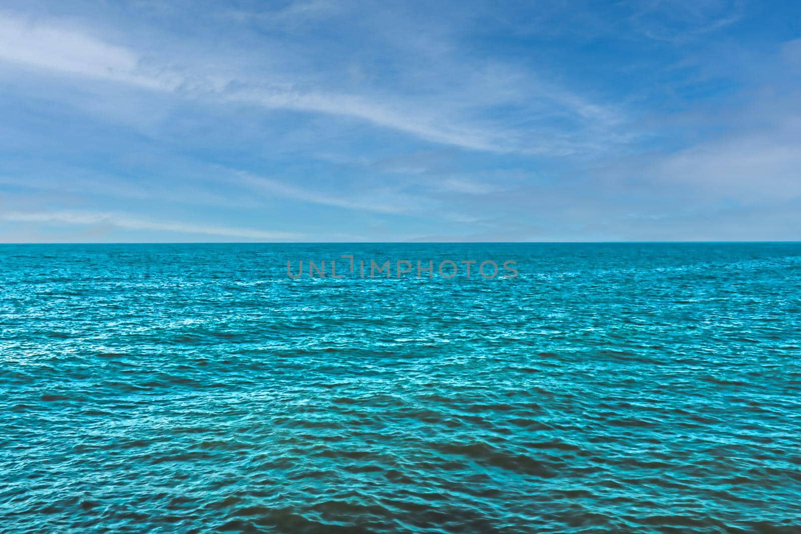 Beautiful turquoise sea water against the blue sky. View from a tropical beach. Summer sunny day, rest. by kip02kas