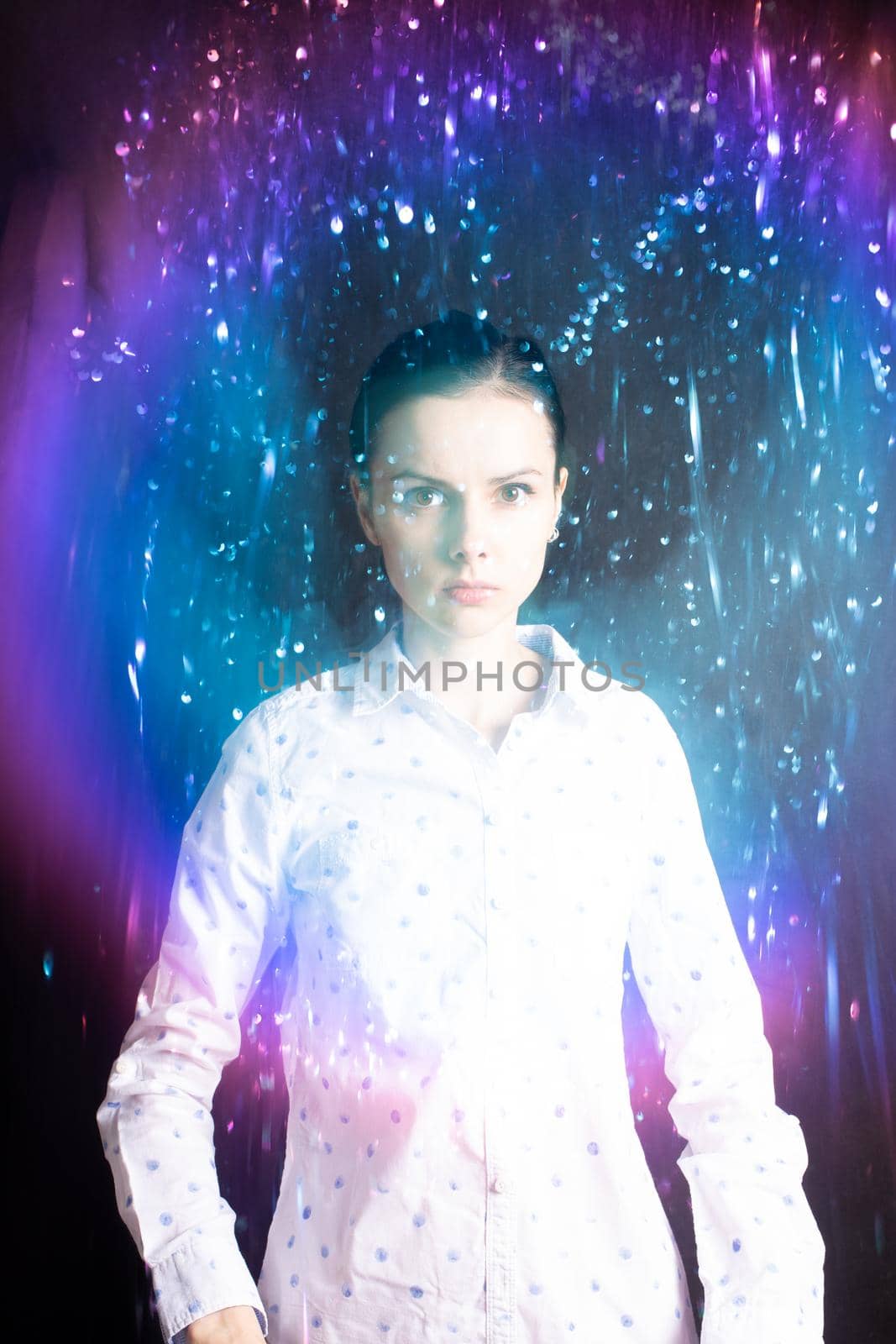 art portrait of a beautiful woman with mixed light. High quality photo