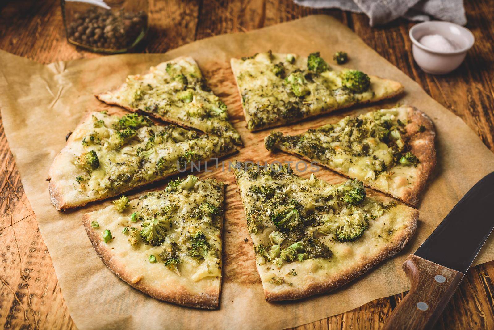 Slices of pizza with broccoli and cheese by Seva_blsv