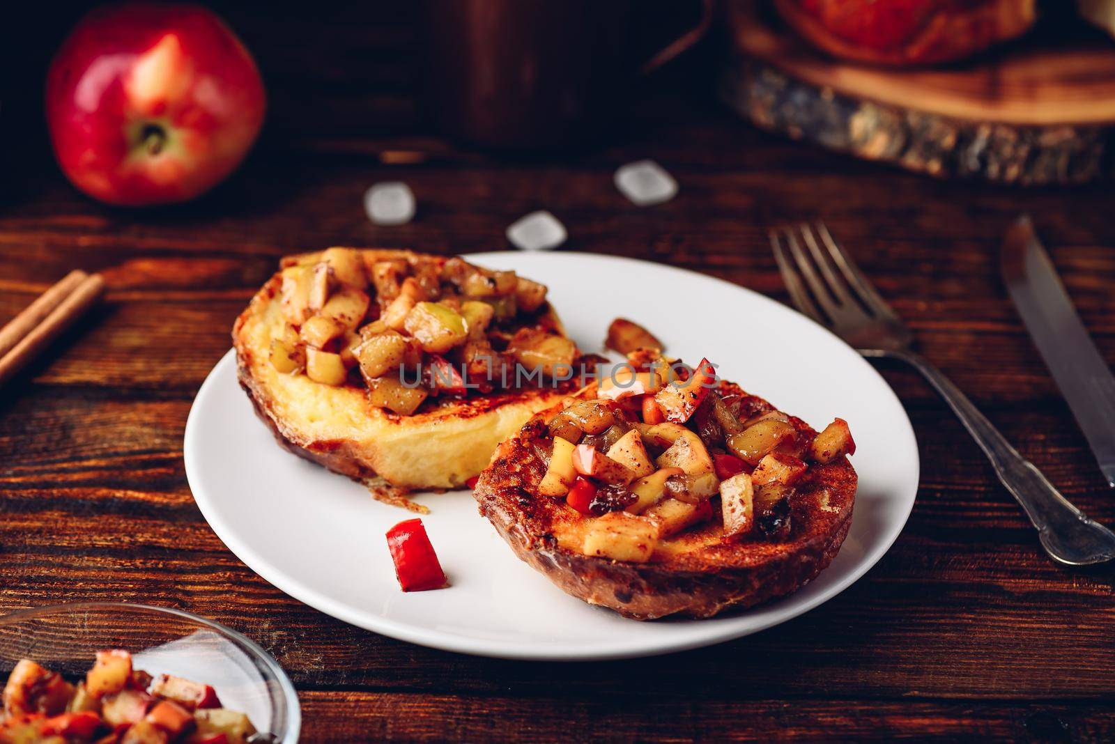 French toasts with chopped apple caramelized with cinnamon