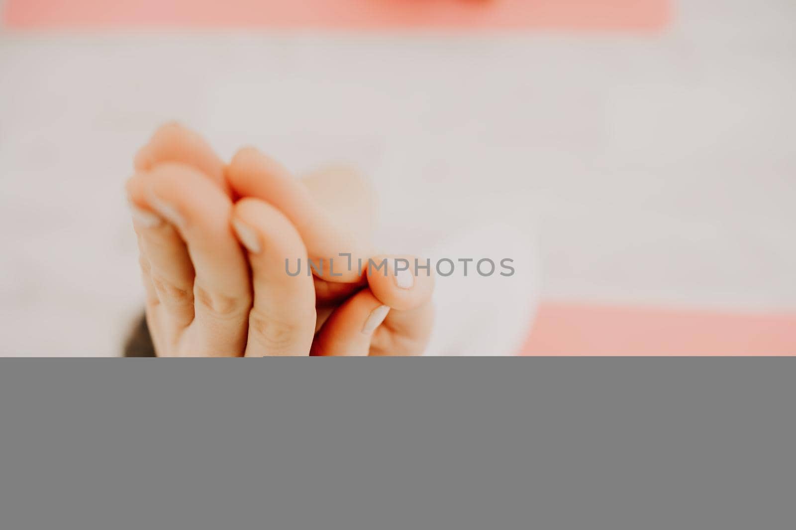 Two young sporty woman, fitness instructor in sportswear doing stretching and pilates on yoga mat in the studio with mirror. Female fitness yoga routine concept. Healthy lifestyle and harmony. by panophotograph