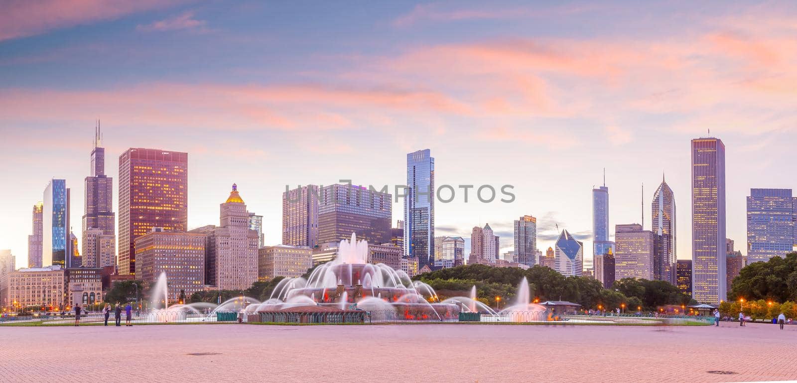 Panorama of Chicago skyline  with skyscrapers and Buckingham fountain at sunset