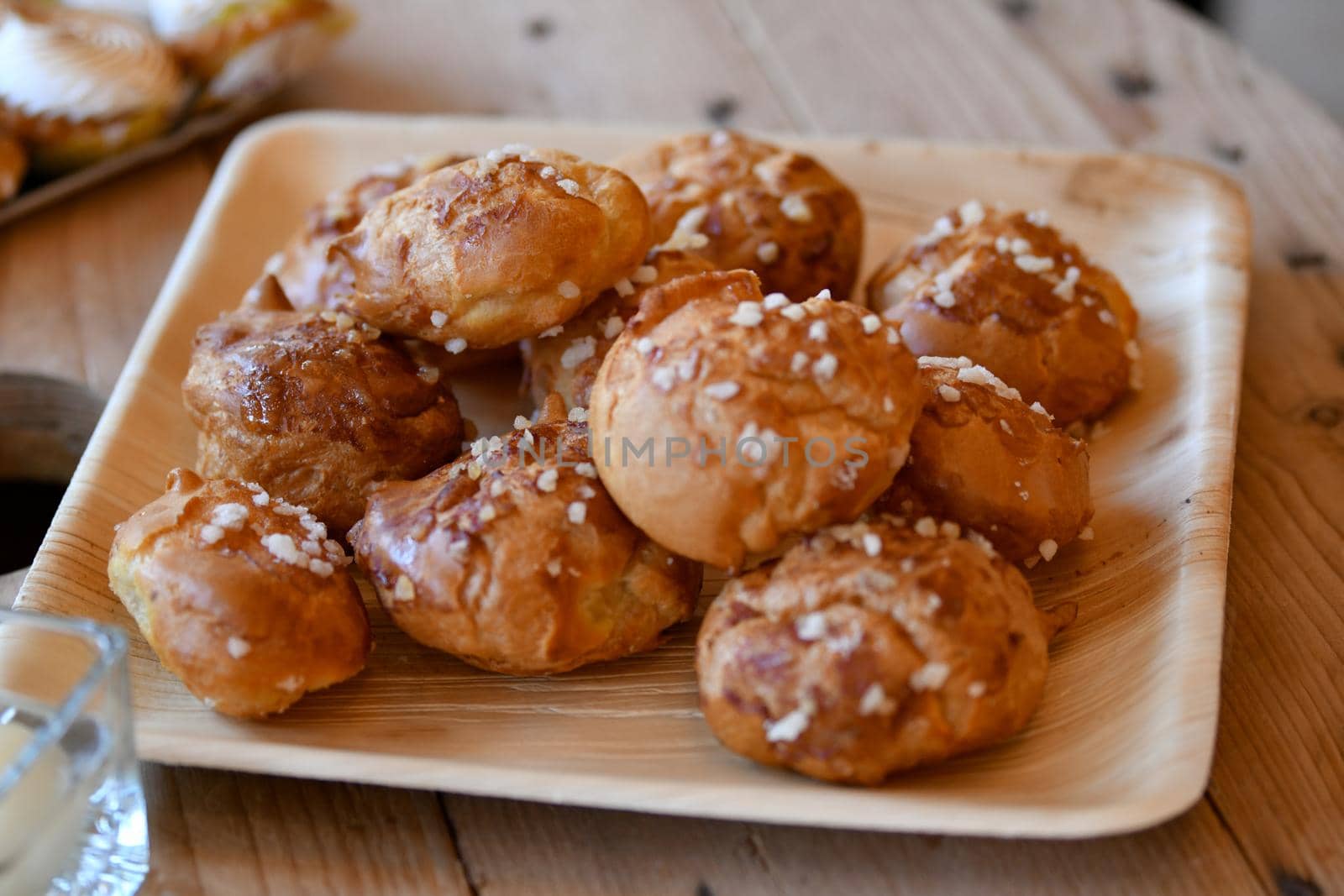 Chouquettes French light cakes sprinkled with a sugar
