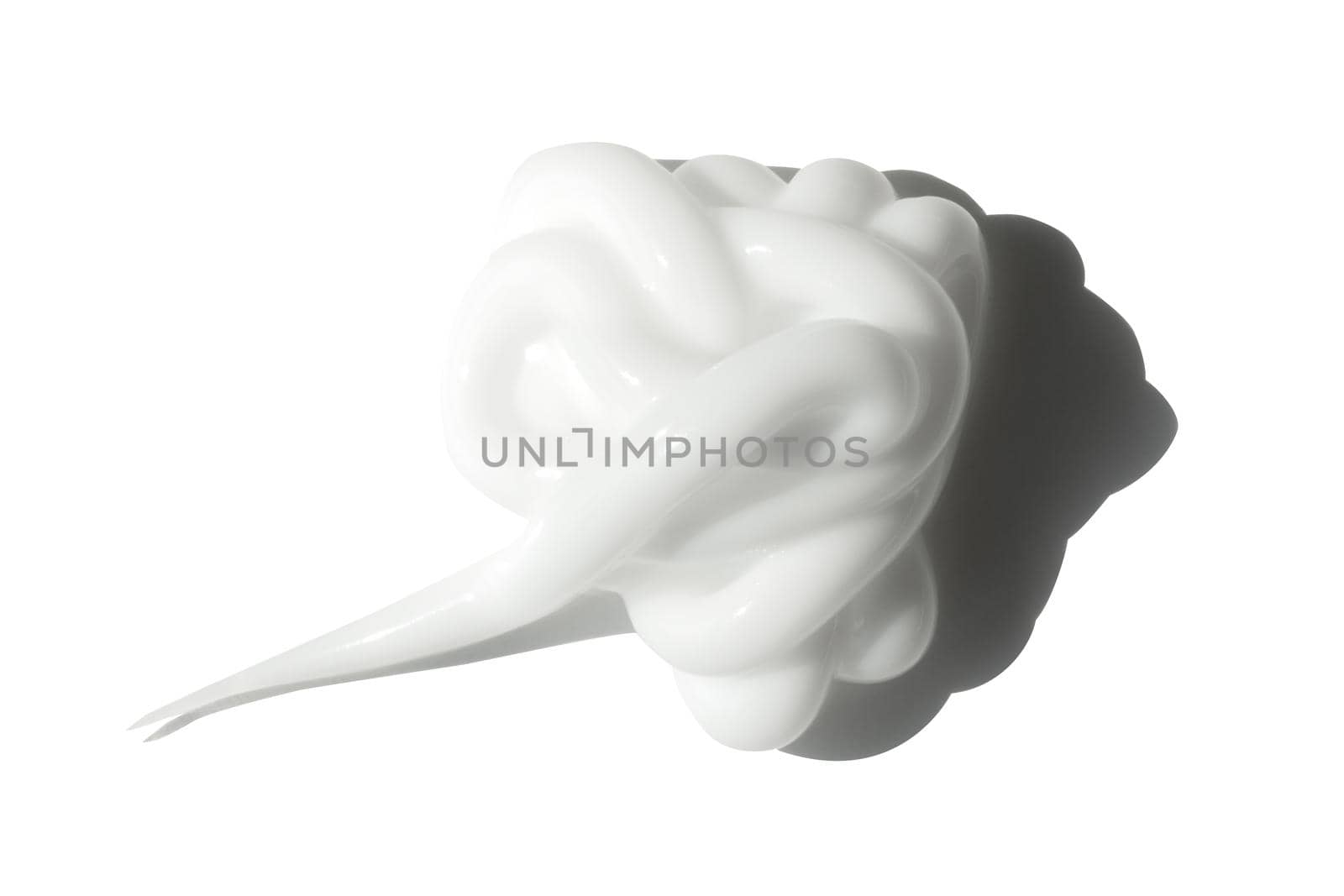 Cream texture swatch stroke squeeze with shadow isolated on white background. Facial creme, foam, gel or body lotion skincare make up sample. Photo face makeup cream cosmetic product smear swirl