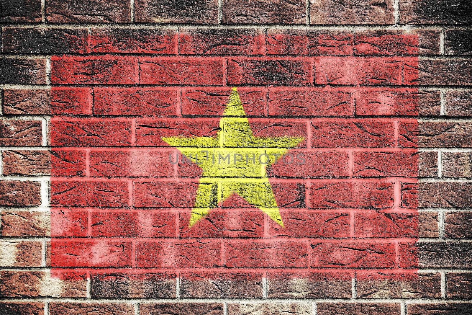 A Vietnam flag on a brick wall background