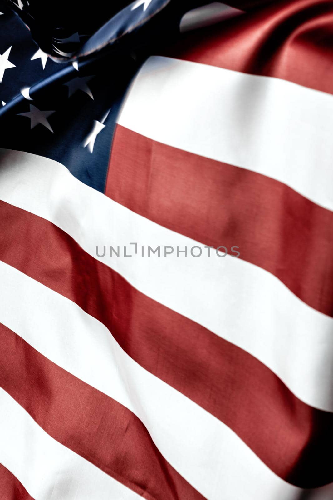 Beautifully waving star and striped American flag. Creative Photo