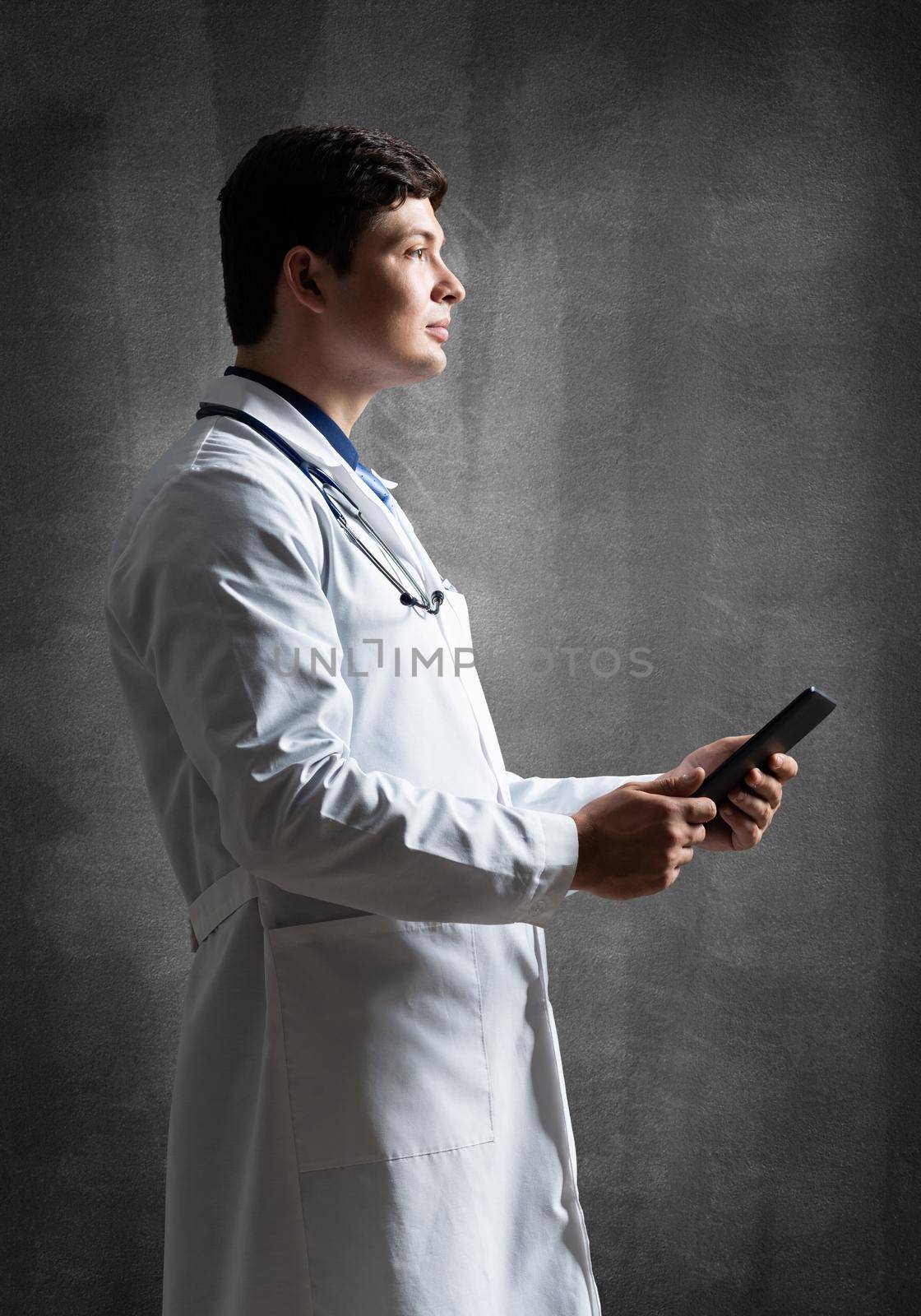 Doctor with a computer tablet by adam121