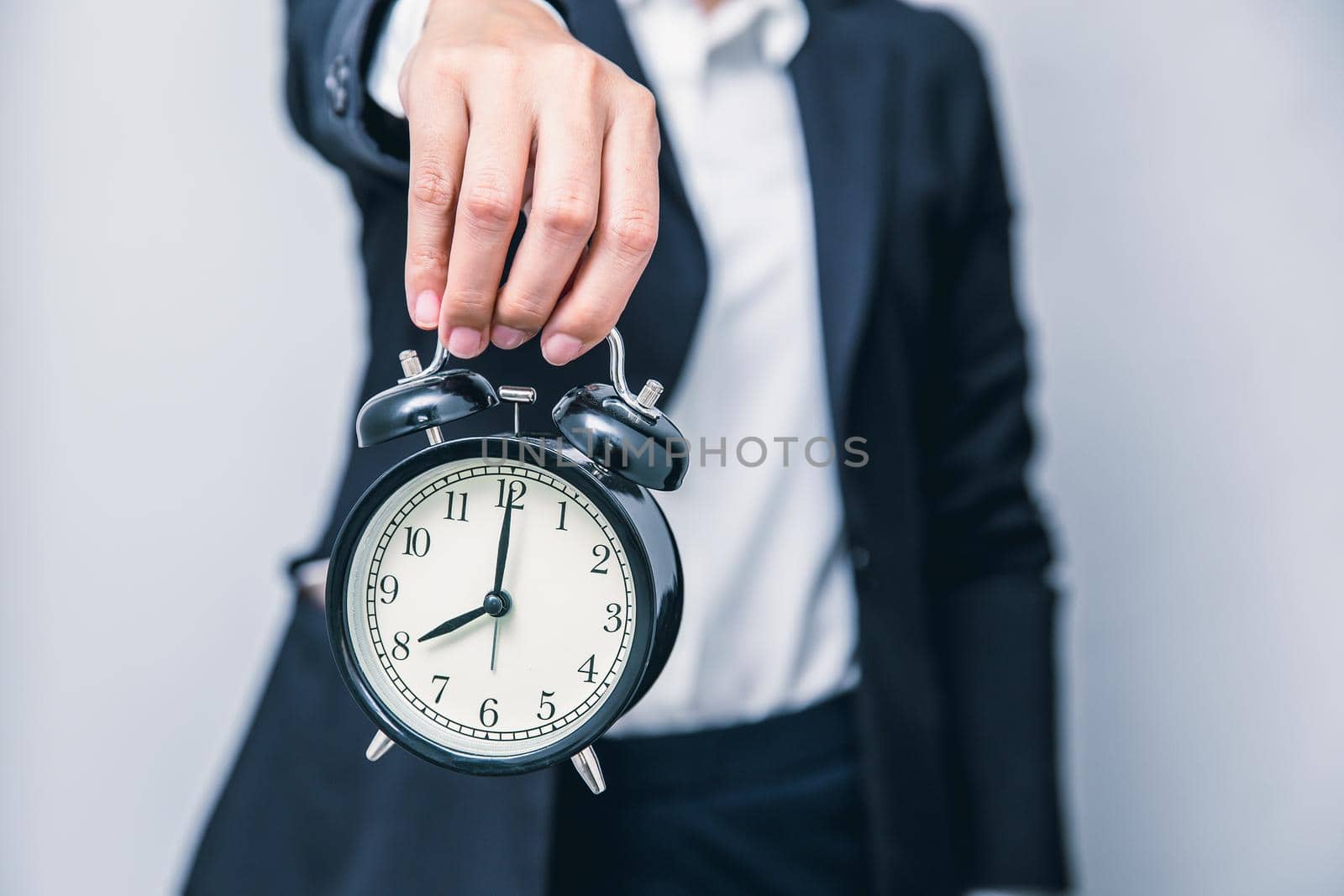 business people with clock times showing for warning time delay urgent or hurry up working concept