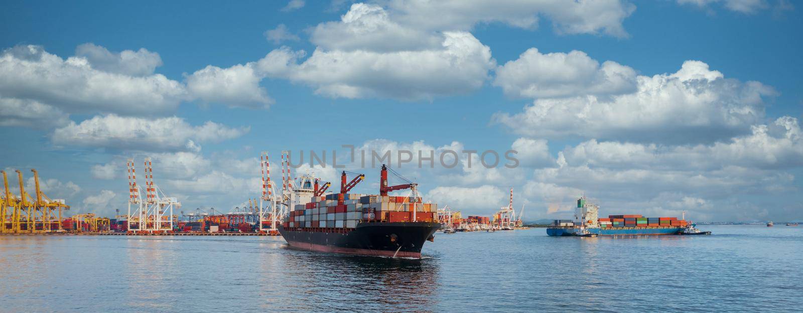 Aerial view container ship at industrial port import export global business company logistic transportation international by container ship, Container cargo vessel freight ship industrial.
