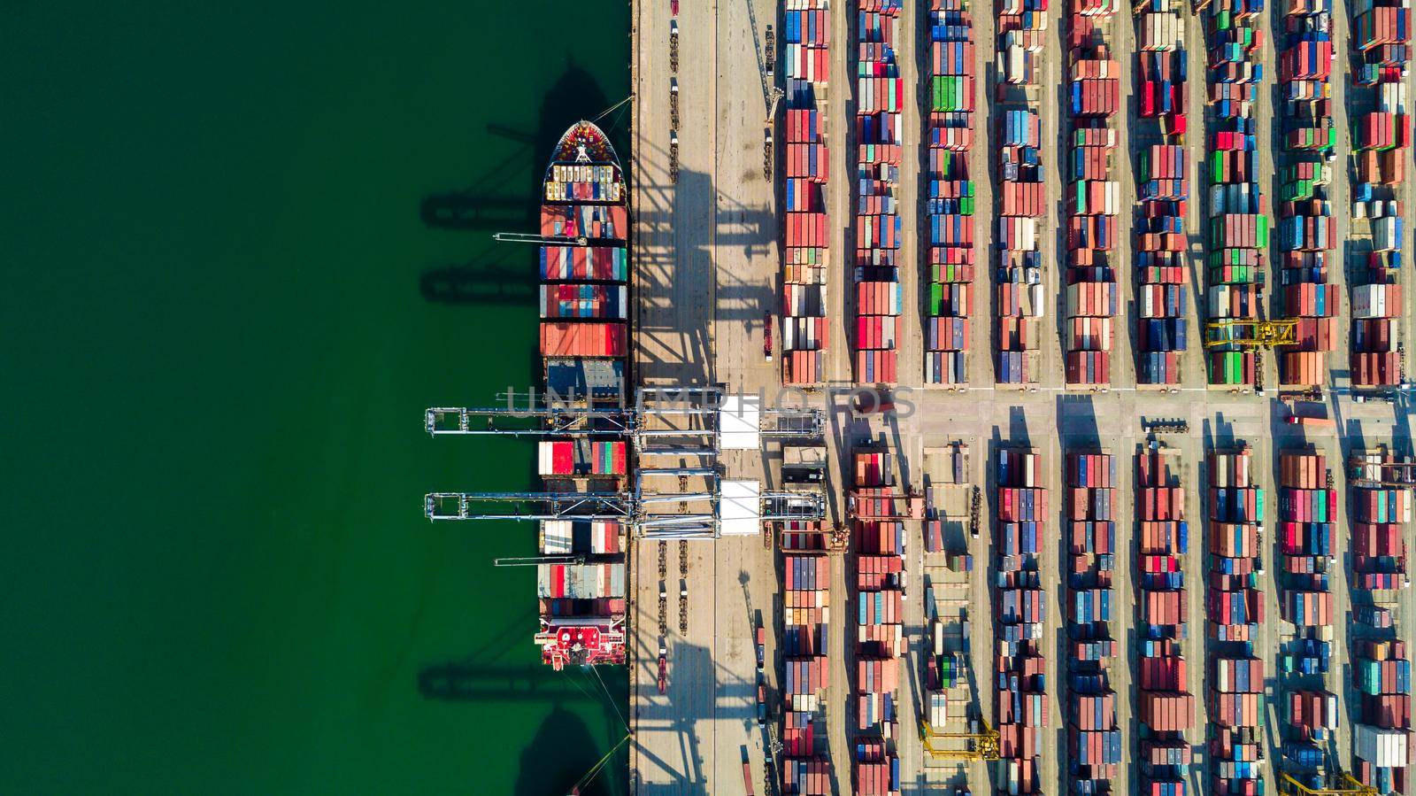 Aerial view container ship freight shipping at port, Global business logistic import and export freight shipping transportation oversea worldwide, Container vessel cargo freight ship international. by AvigatoR