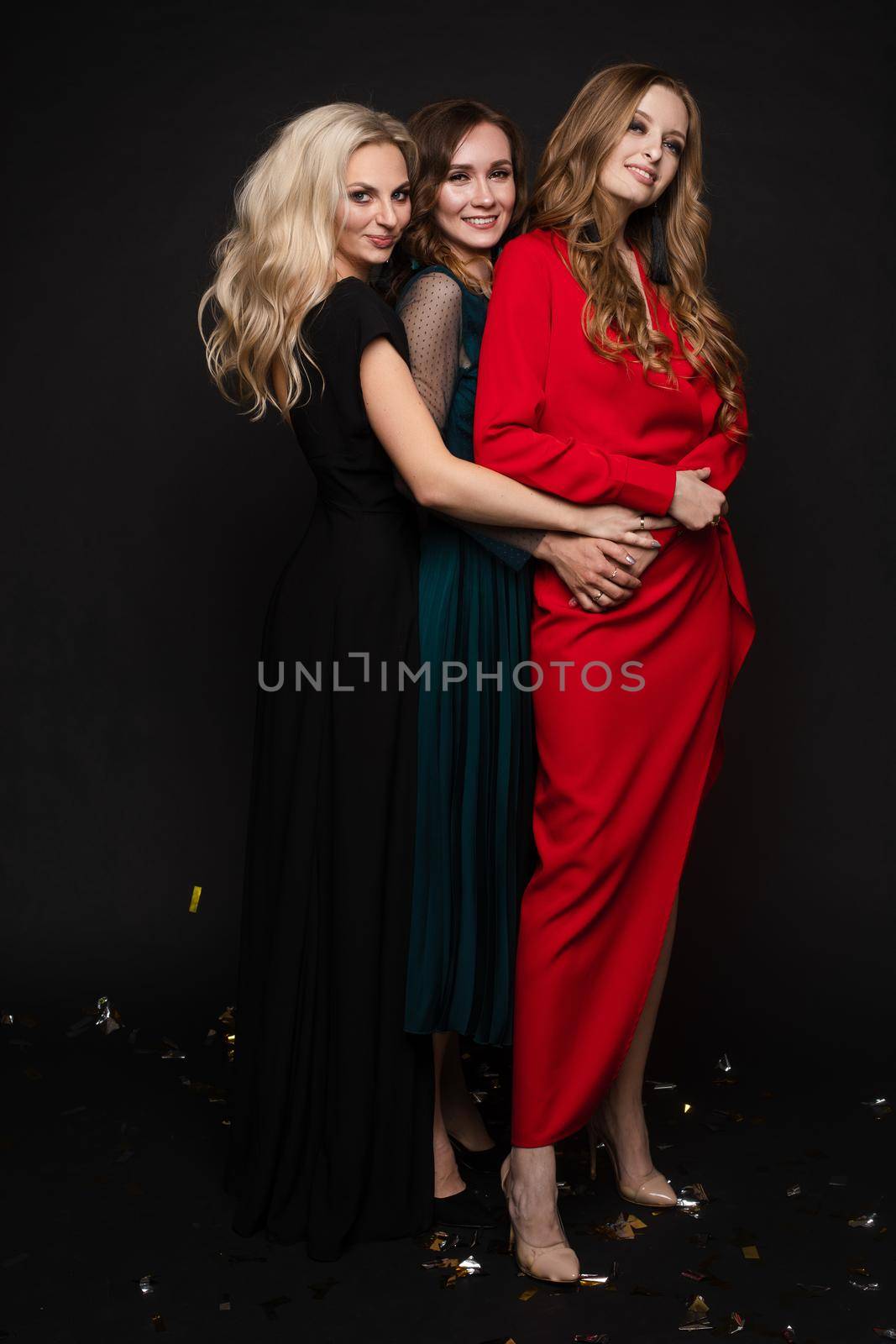 Gorgeous ladies in evening dresses.Year evening celebration birthday concept. by StudioLucky