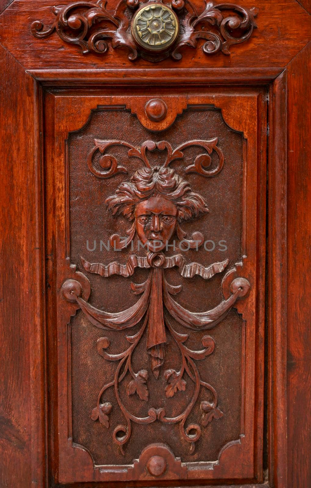 Old carved wooden door in Villajoyosa town, Alicante, Spain