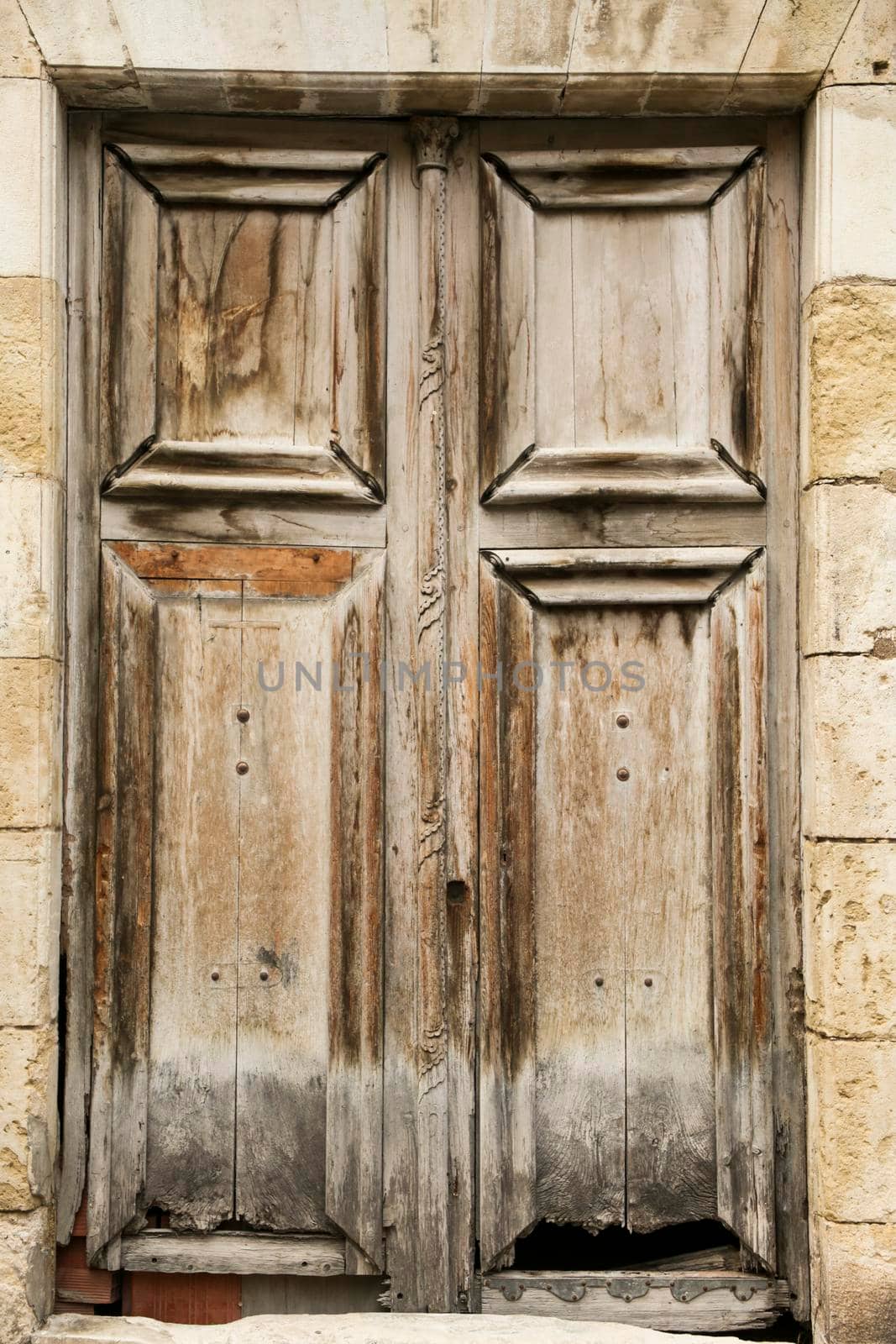 Old carved wooden door in Spain by soniabonet