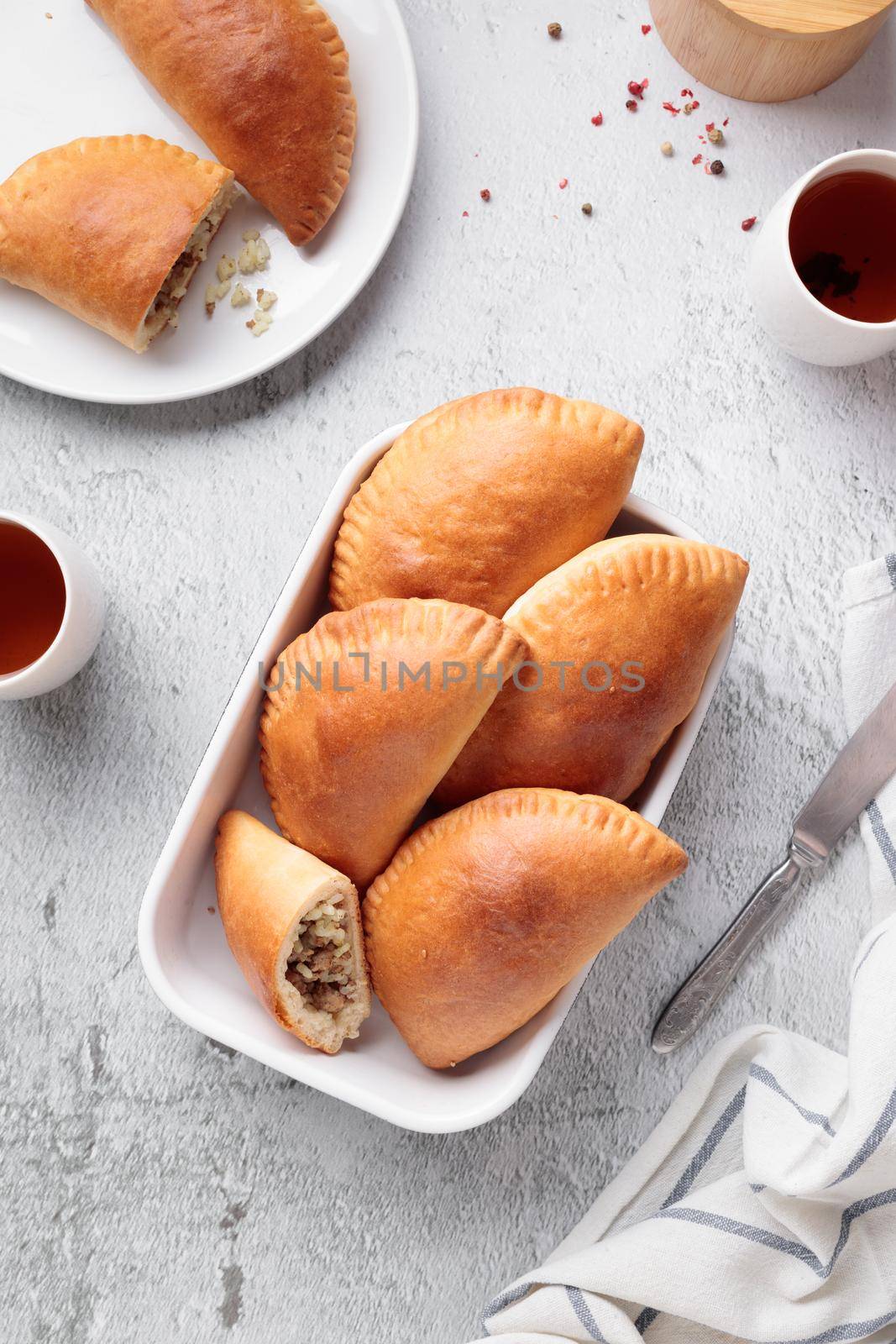 Fresh hot homemade buns filled with meat and rice