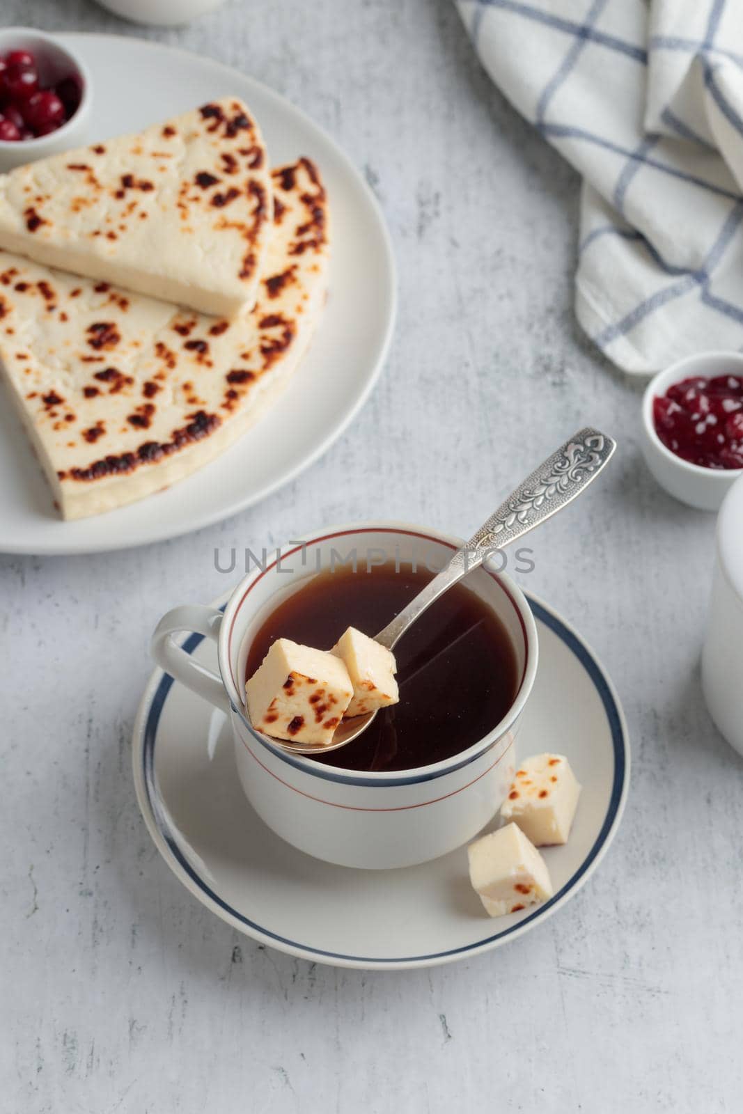 Coffee with Leipajuusto - traditional Finnish baked cheese on a table