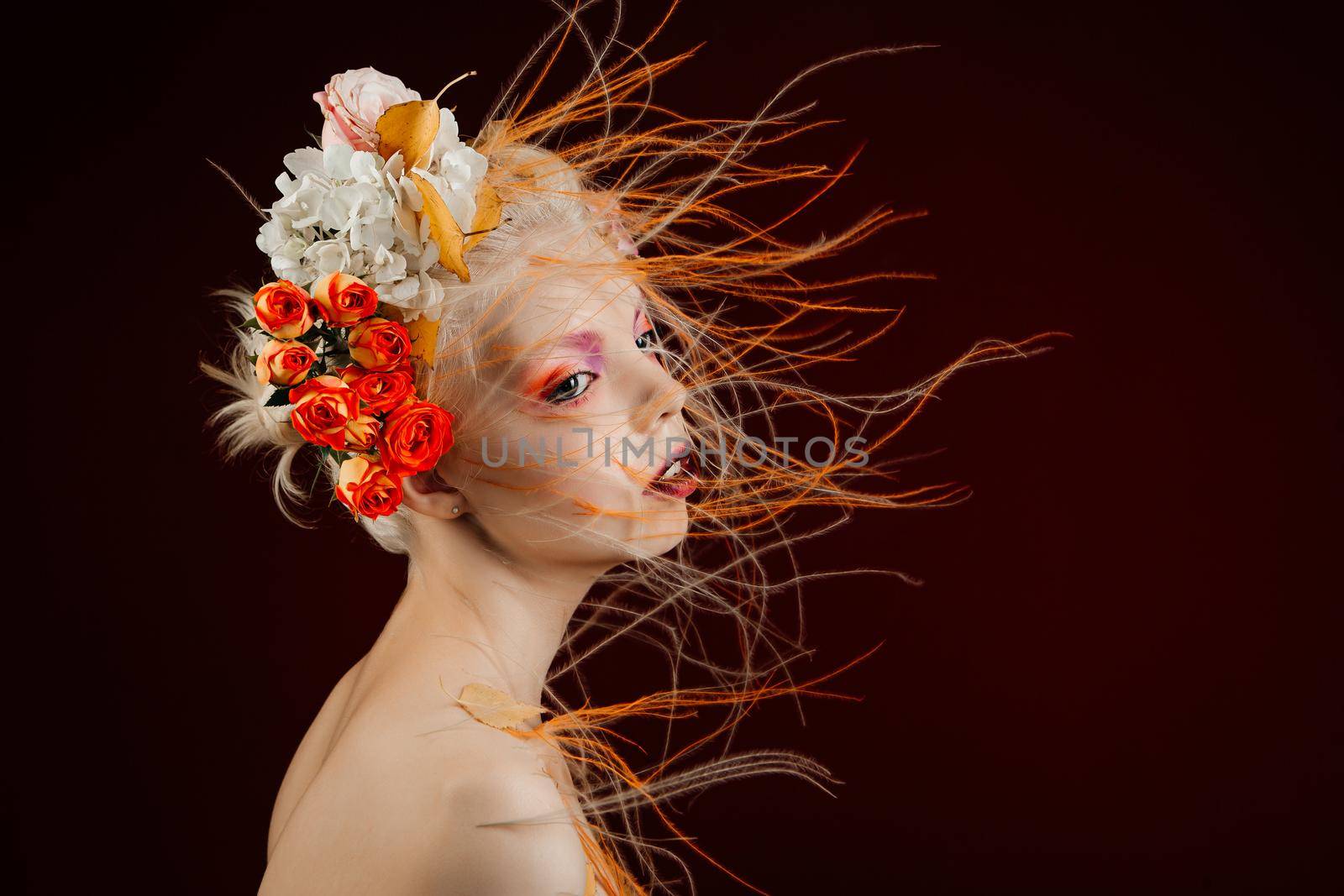 A girl with lively curly hair and flowers in her head. Art object. Flower Fairy by deandy