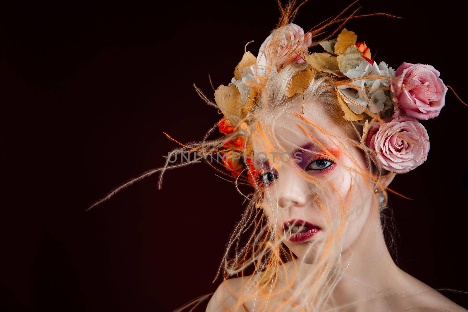 A girl with lively curly hair and flowers in her head. Art object. Flower Fairy by deandy