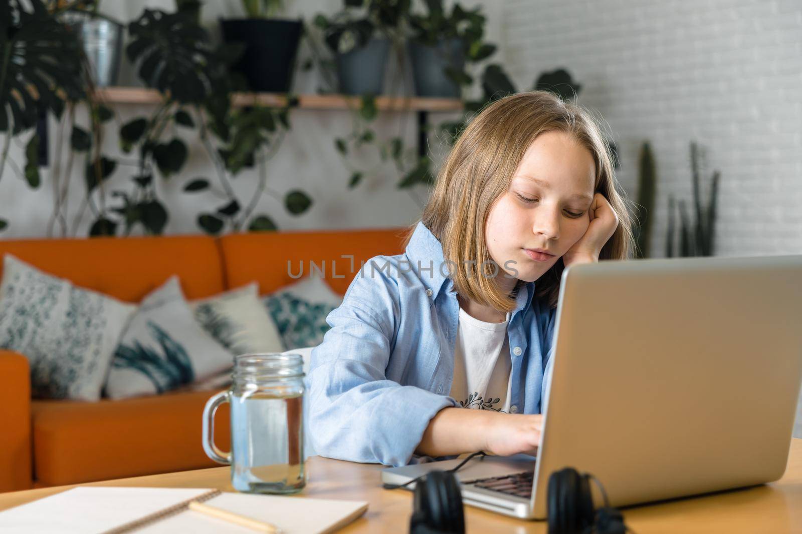 teenager is studying at home on carrantine. High quality photo