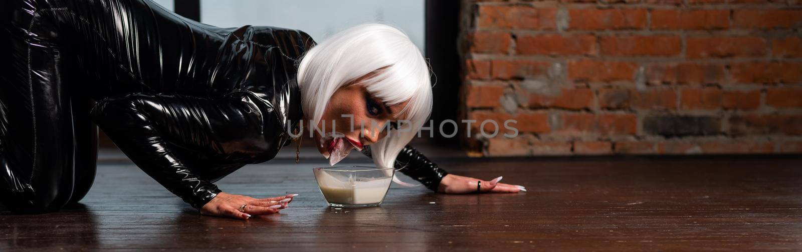 A sexy woman in a short white wig and a latex suit drinks milk from the floor as a cat. Role-playing games by mrwed54