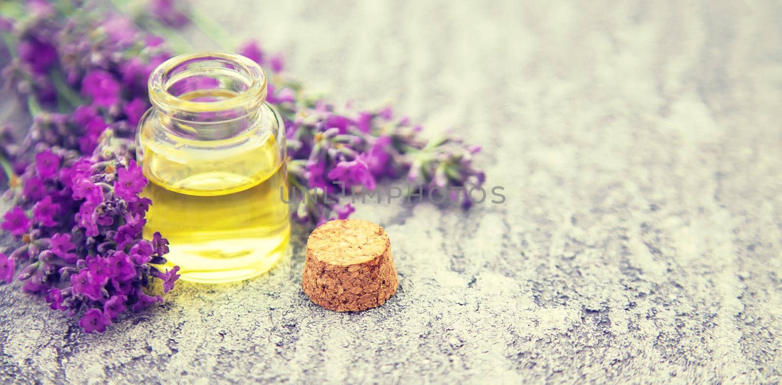 Lavender essential oil in a small bottle. Selective focus. nature.